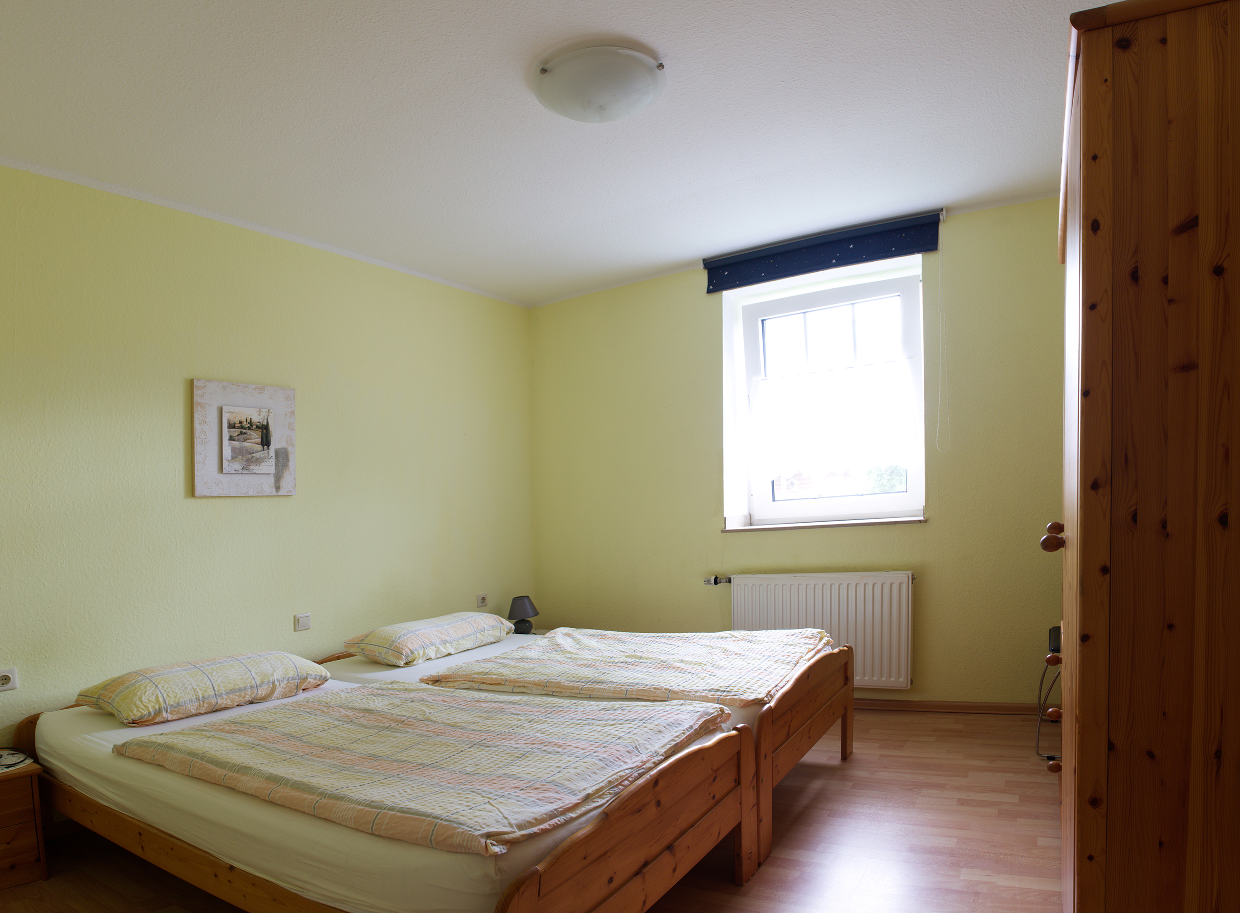 Schlafzimmer einer Ferienwohnung in Coesfeld-Lette
